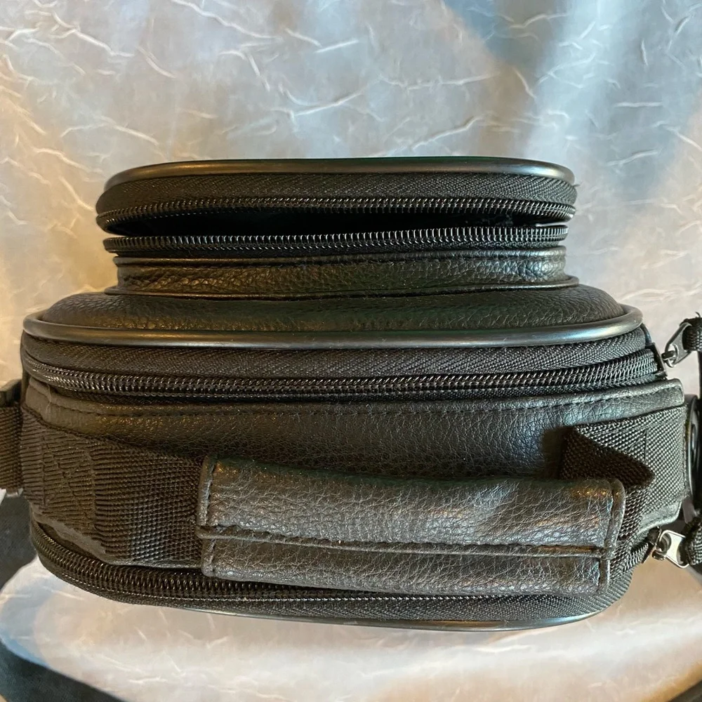 View Black Leather PaddedCamera Bag with Durable Construction and Compact Design
